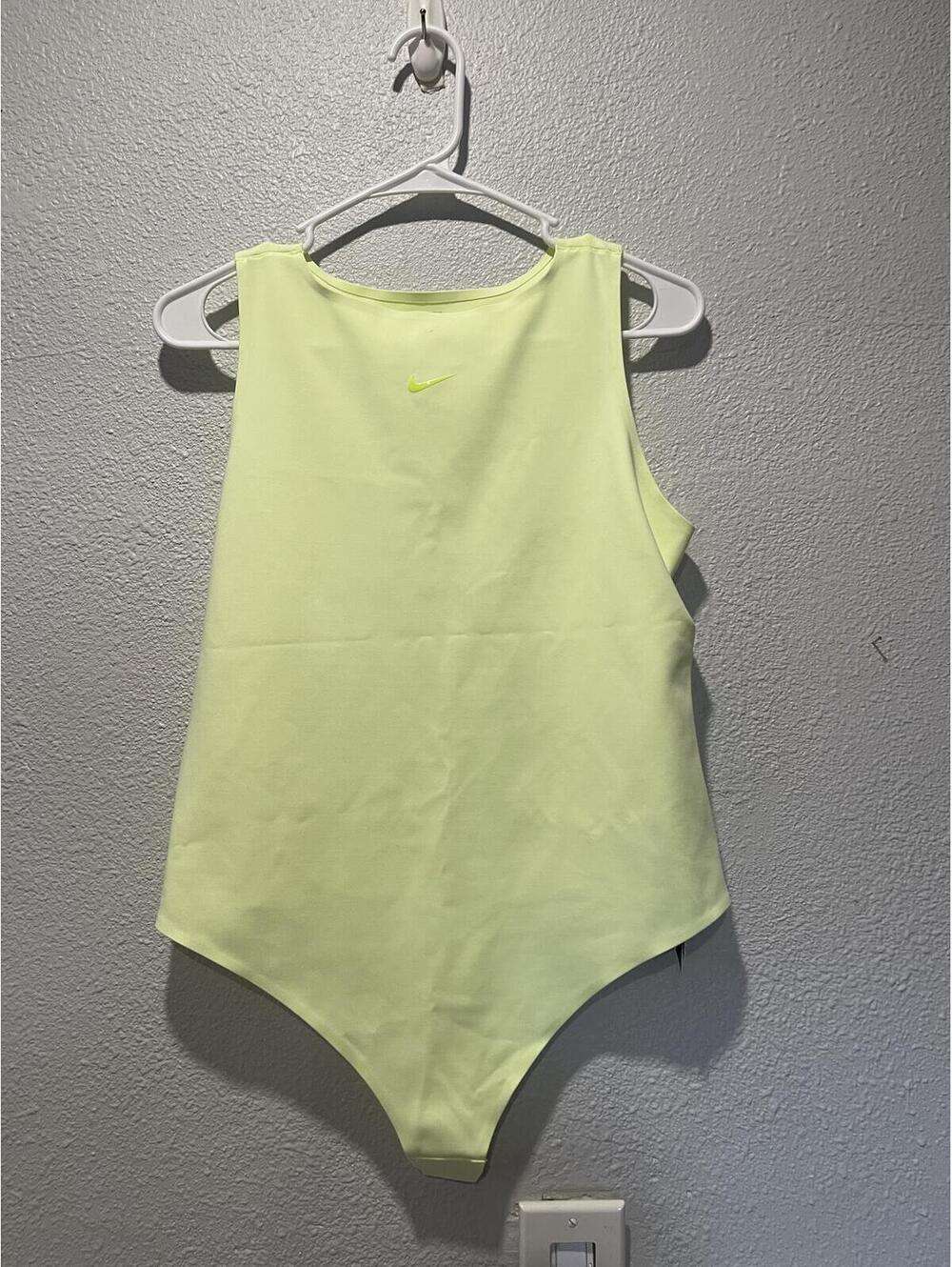 Nike Sleeveless Bodysuit in Light Yellow